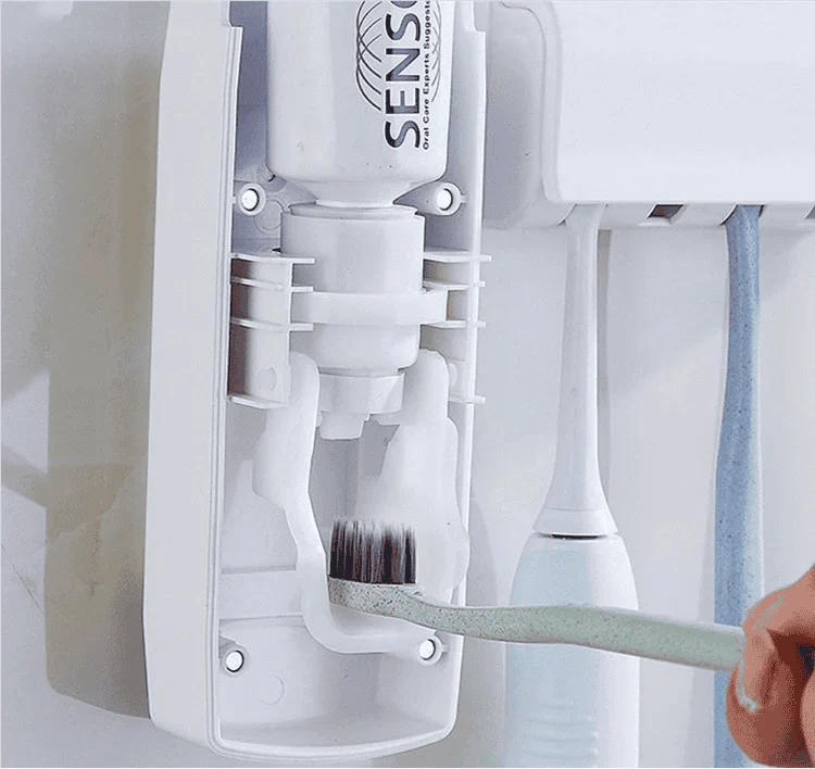 Toothpaste Dispenser With Holder.